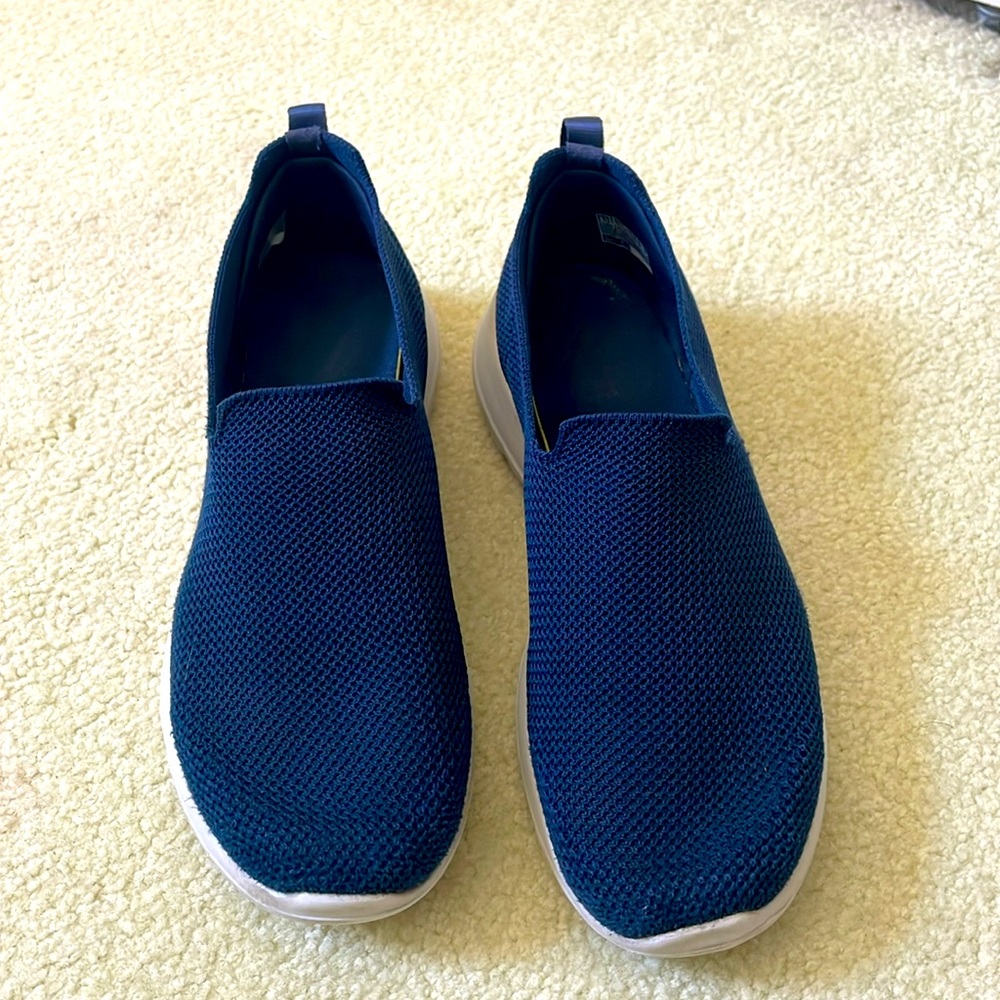 Skechers Go walk slip-on sneakers.